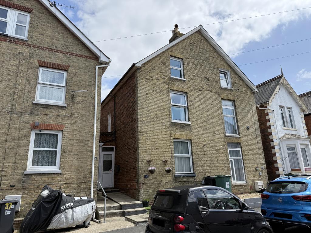 Lot: 108 - THREE-BEDROOM THREE STOREY HOUSE FOR INVESTMENT - Front of property with brick elevation